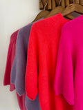 Premium knit floral button detail