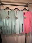 Soft heart detail v neck top