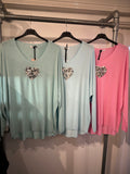 Soft heart detail v neck top
